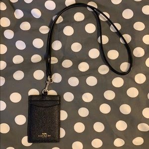 Coach black lanyard with clear ID pocket